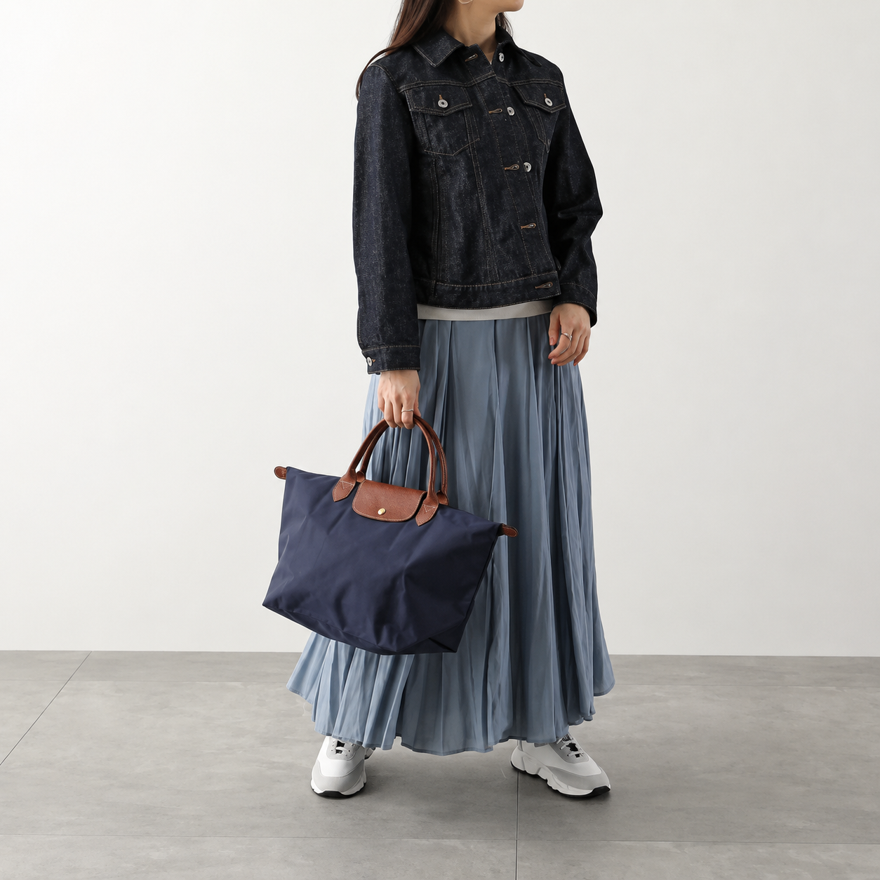 Borsa a mano con manici in pelle e fodera impermeabile