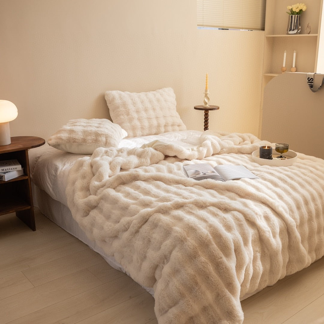 Copripiumino in maglia grossa con pelliccia sintetica